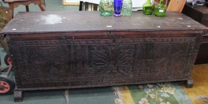 A probable 18th century coffer with later carved front