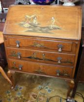 An Edwardian writing bureau with chinoiserie decoration