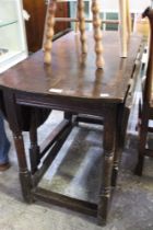 An 18th century oval oak dropleaf, gateleg dining table, 102cm