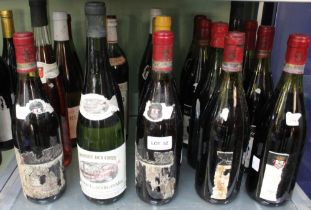 Twenty bottles mixed from a damp cellar missing labels 80/90s