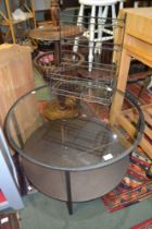 Decorative wirework hanging shelf and an Ikea glass top coffee table