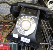 A vintage black Bakelite telephone