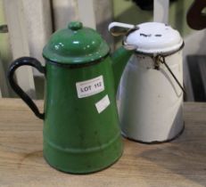 A vintage green enamelled coffee pot with a white enamelled cannister