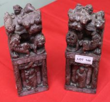 A pair of substantial Chinese soap stone seals with carved dog of Fo