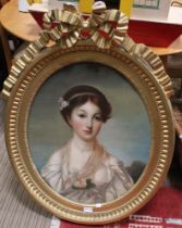 19th century British School, portrait of a young lady, revealingly clad in classical robe, landscape