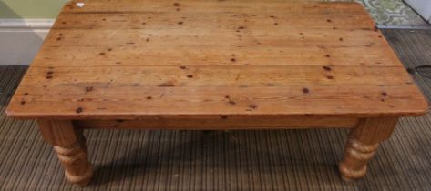 A large pine coffee table
