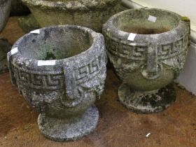 Two small cast garden urns