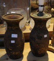 A pair of Japanese Meiji Period iron vases with mixed metal work in the form of a landscape in the