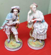 A pair of Chantilly French bisque porcelain figurines, musicians, the man with bagpipes, the lady wi