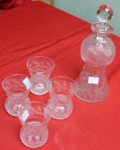 A Scottish crystal glass Whisky decanter and set of four glasses, cut and etched thistle design