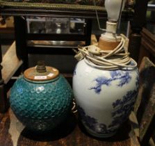 A turquoise bulbous pottery lamp base with an Oriental blue and white example