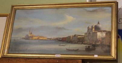 An oil on canvas of a Venetian scene indistinctly signed in gilt frame