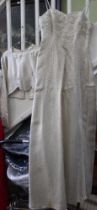 An 'Ayris of Cheltenham' wedding dress with bolero jacket ('Ayris' was bought by Cavendish House lat