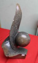 A 20th century, Abstract Form, polished stone sculpture, reminiscent of the work of Brancusi, 42.5cm