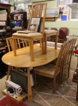 A craftsman built oak table and six chairs designed and built by Robin Furlong