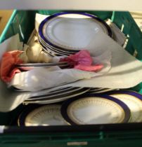 A crate containing a selection of Royal Worcester Regency tea and dining plates