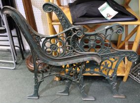 A pair of cast iron bench ends