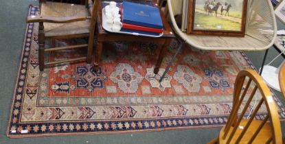 A red and blue ground floor rug with geometric pattern 230 x 157 cm