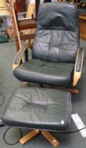 A vintage Unico Danish green leather bentwood arm chair with matching foot stool