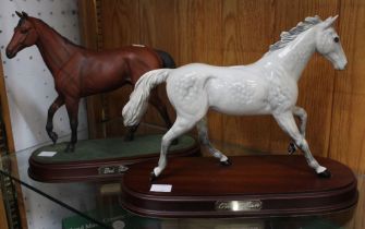 Horseracing : A Beswick ceramic model of racehorse "One Man" on wooden plinth together with another