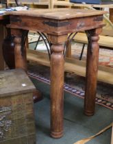 An imported hardwood square occasional table with metal decoration