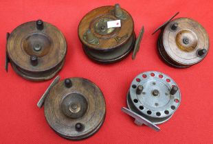 A collection of four early wooden fishing reels together with a metal one (5)