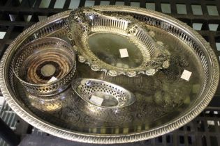 A silver plated tray, wine coaster and two dishes