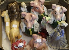 A box containing a selection of ceramic figures to include Beswick Wade Royal Doulton etc