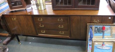 A Mid-Century Sideboard with brass drop handles