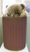 A Lloyd Loom style Linen Basket together with a Teddy Bear