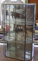 A small glass hanging display case