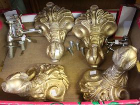 Four gilt ball and claw bath feet and two pairs of taps