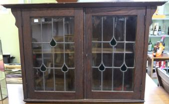 Early 20th century leaded glass oak cabinet