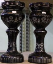 A pair of late Victorian ruby glass etched vases