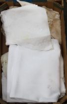 A box of vintage linen to include table cloths etc