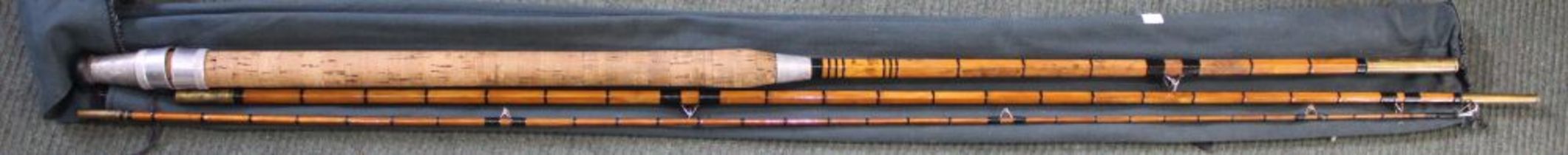 Three piece 10.5 ft cane rod marked "Chubbs General" Chubbs tackle makers London and Hertfordshire