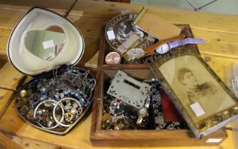 Two boxes of costume jewellery, photo frames etc