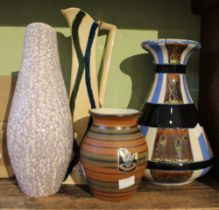 Four various decorative vases, to include a Kendal Studio example