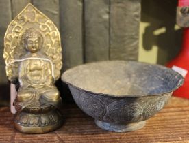 A meditating buddha statue, together with a Tibetan Buddhist monk's alms bowl, both with seal to ba