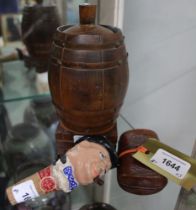 3 items: a novelty "pull up" cheroot dispenser in the form of a carved oak barrel, together with a c