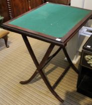 An Edwardian folding occasional table with baize top