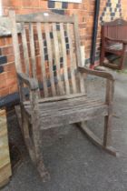 A wooden rocker garden chair