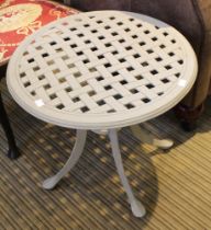 A modern metal latticed top garden side table