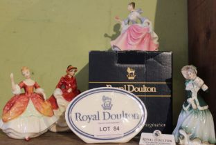 Four Royal Doulton Ladies with two Doulton advertising plaques