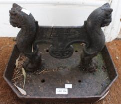 A cast iron Victorian boot scraper