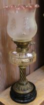 Victorian oil lamp base with glass globe