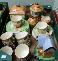 A Beswick cottage ware three piece tea set, cups, saucers and tea plates etc