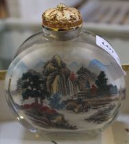 A large round inside painted Chinese scent bottle with evocative mountain scenery