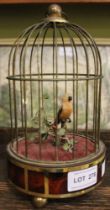 A clockwork automaton bird in cage, 21cm high