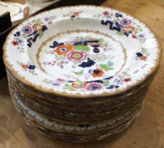 A set of six 19th century ironstone bowls, hand coloured floral decoration, 25.5cm diameter, togethe